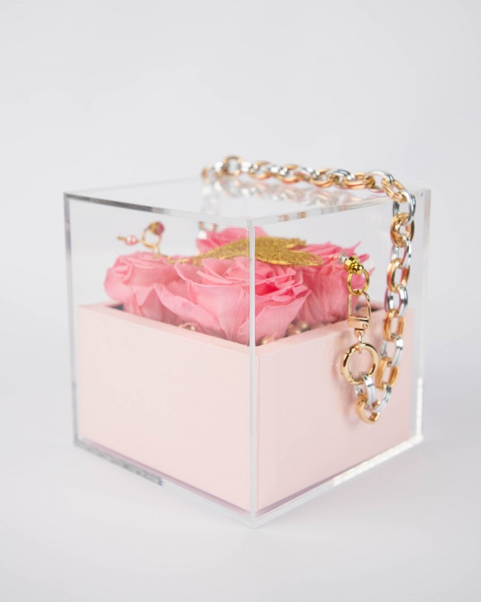 Forever roses pink in plexiglass bag