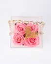 Forever roses pink in plexiglass bag