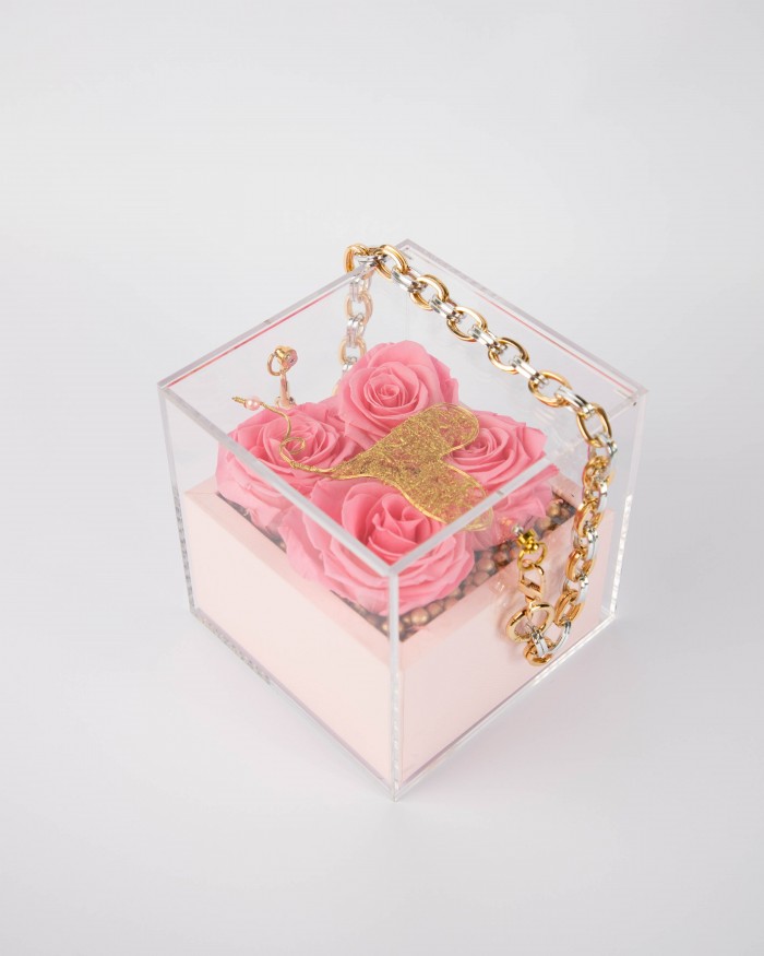 Forever roses pink in plexiglass bag